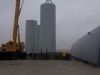 Crane moving tank #1 into the containment