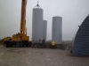 Crane moving tank #2 into containment.