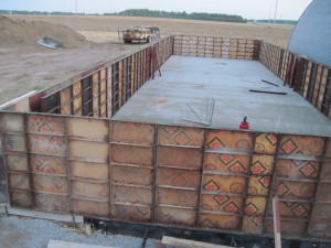 Containment walls formed